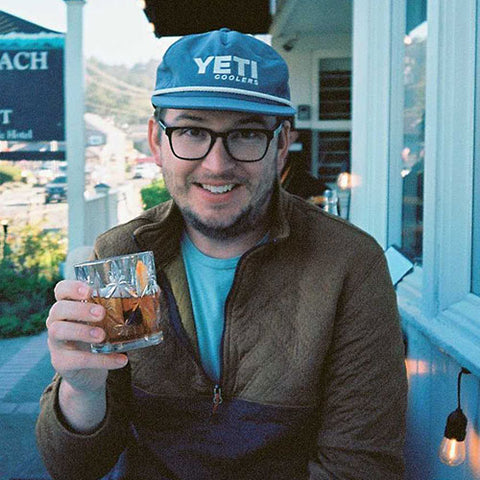 Happy Aaron with a drink